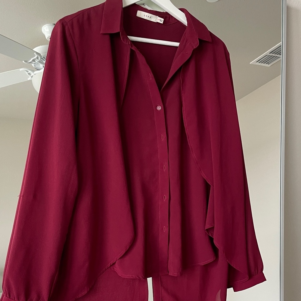 Red draped dress shirt with high low look